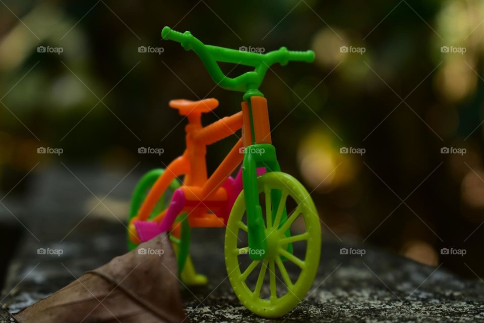 abstract image of multicolored toy cycle ,