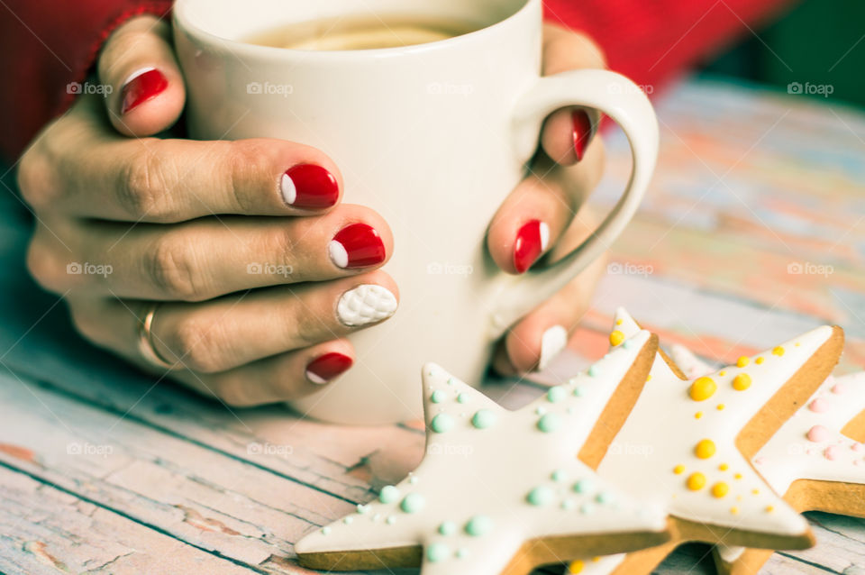 woman hand with cup of tea