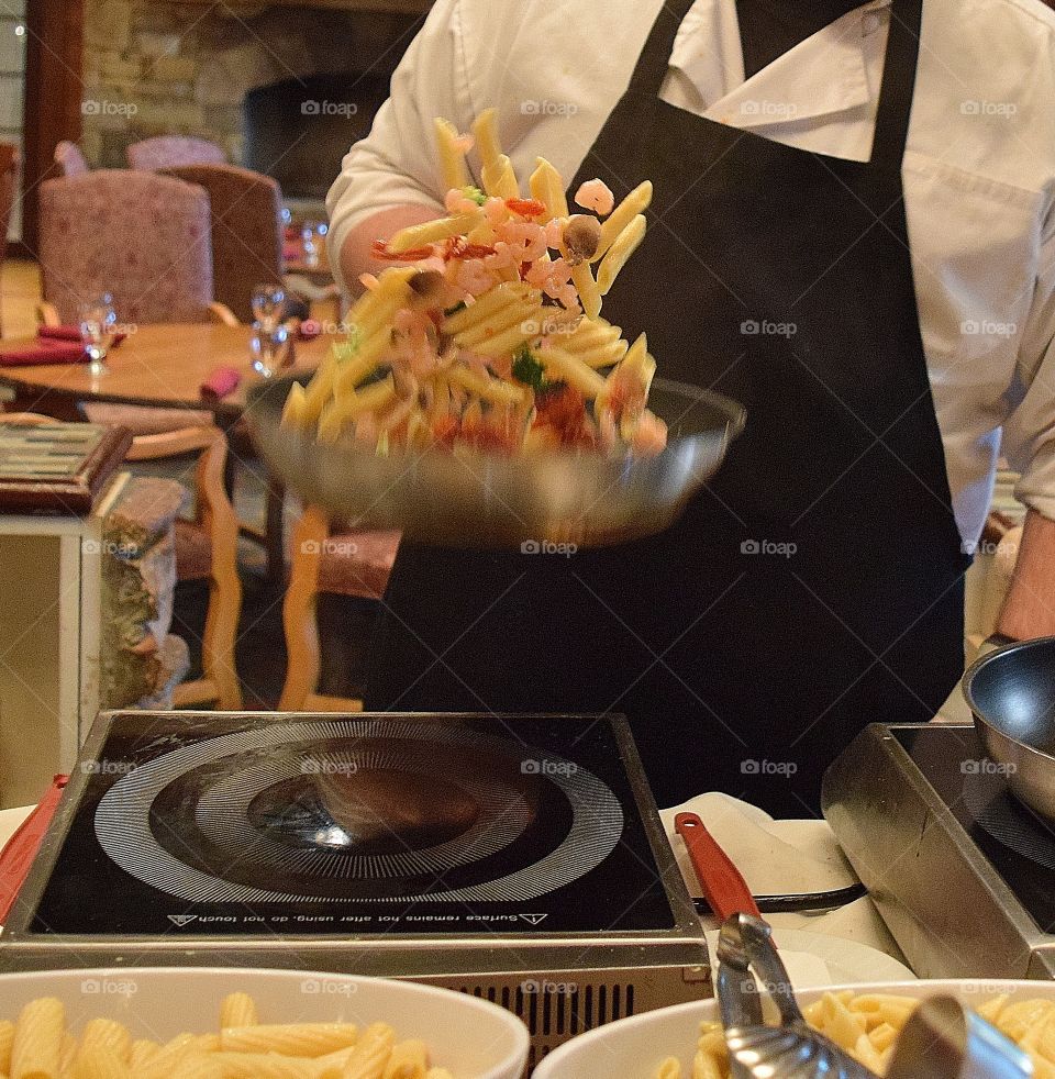 Chef preparing pasta