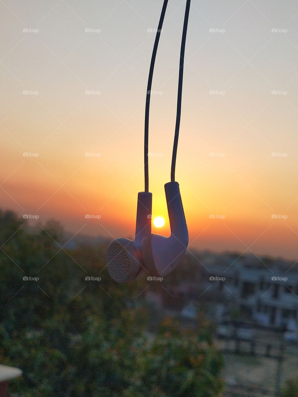 Music and chilling with this beautiful sunset view from rooftop of my house is a perfect example of living in harmony.📸😍