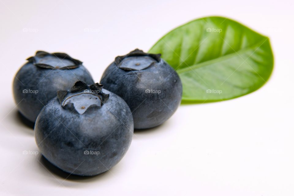 Three blueberries