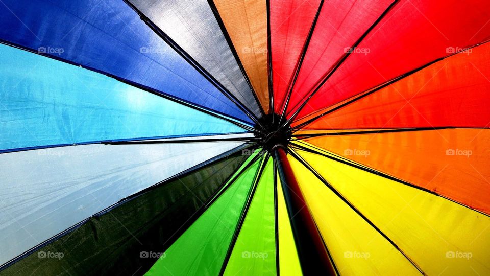 The colorful Umbrella, Accept the fall of rain  And compose the melody