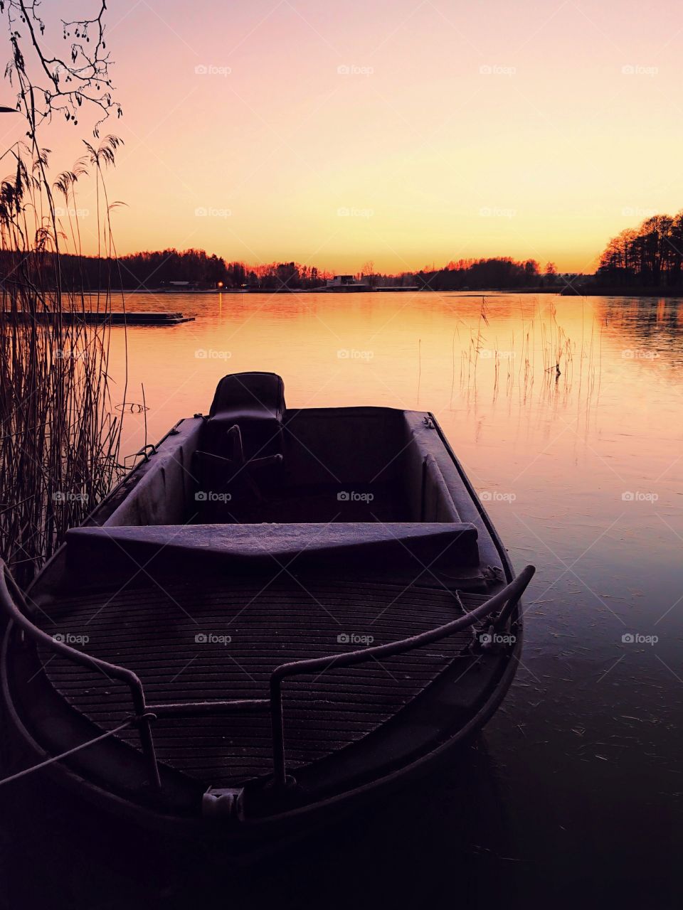 Boat. Sunset on lake