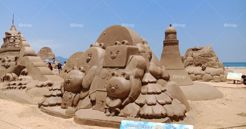 sculpture building sand