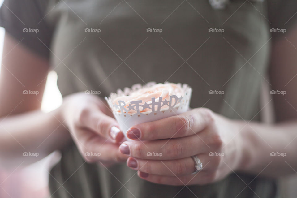 Cupcake in hands 