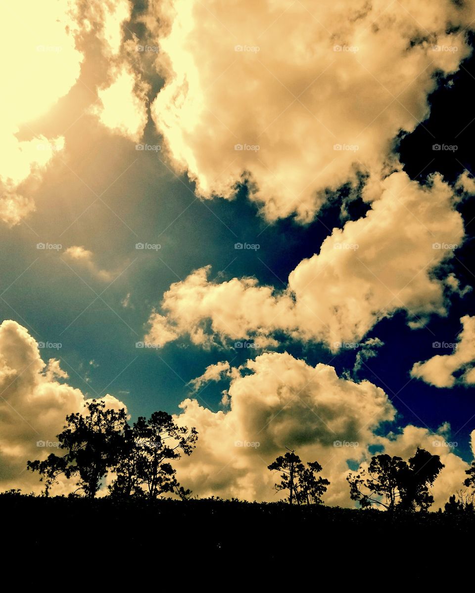 Sun piercing through the clouds