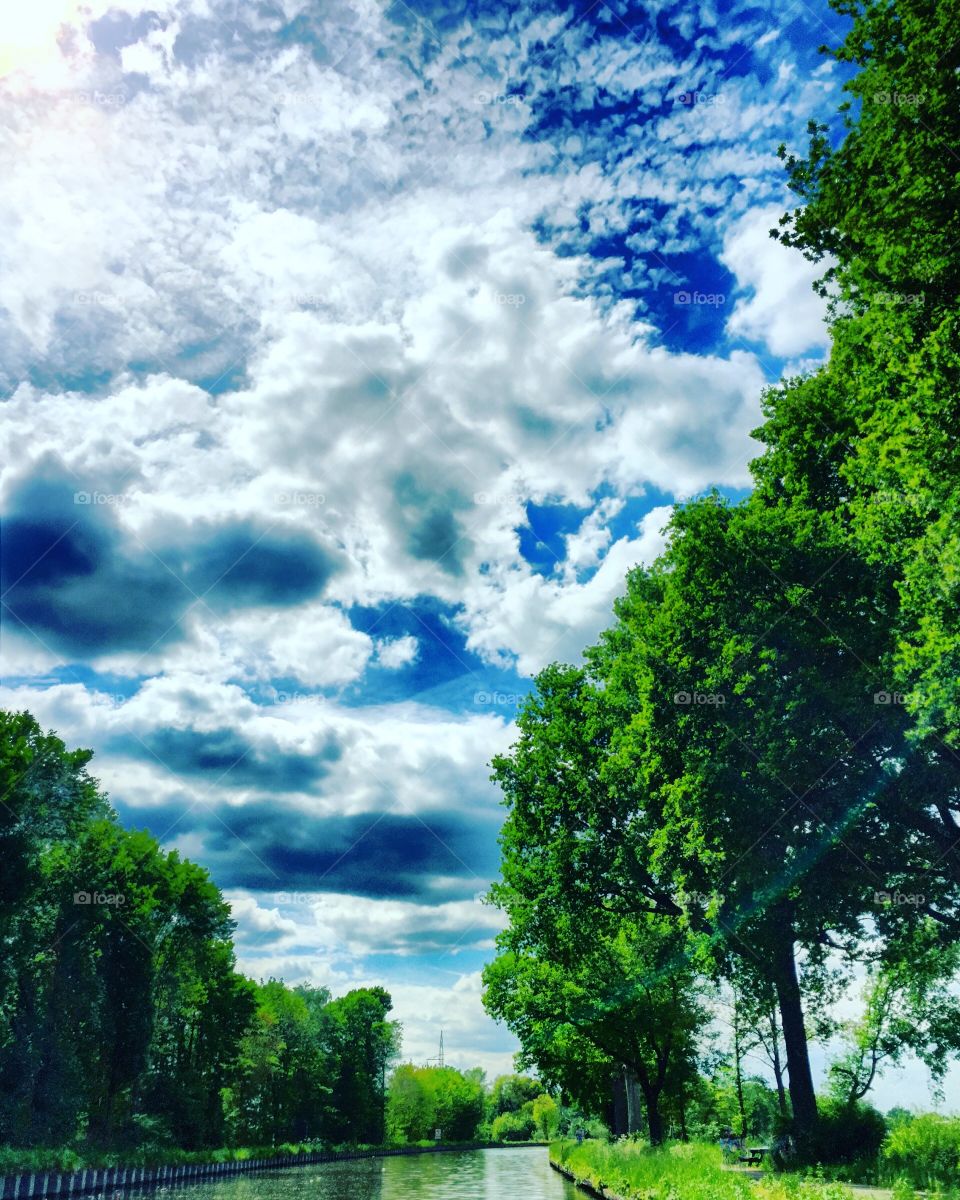 Clouds reflected in the water of the river 