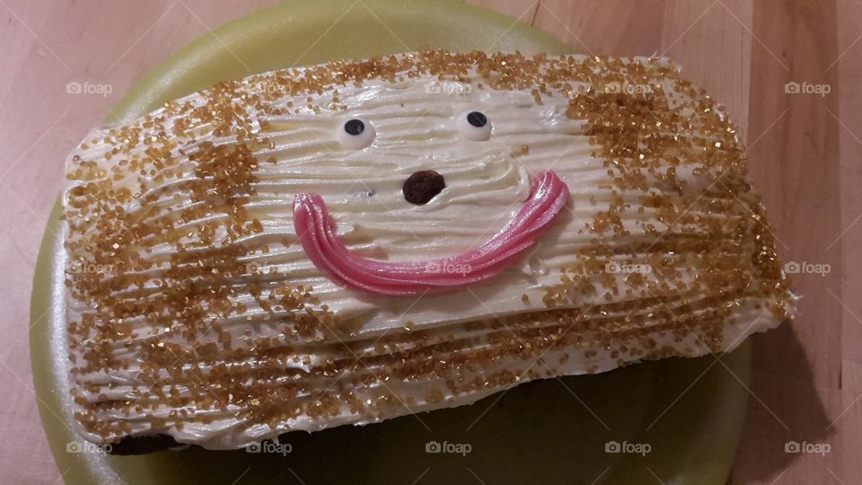 Happy Smiling Face On A Birthday Cake