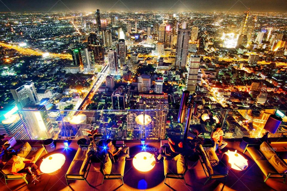 Night light of the central city , Roof top Mahanakorn building Bangkok Thailand 