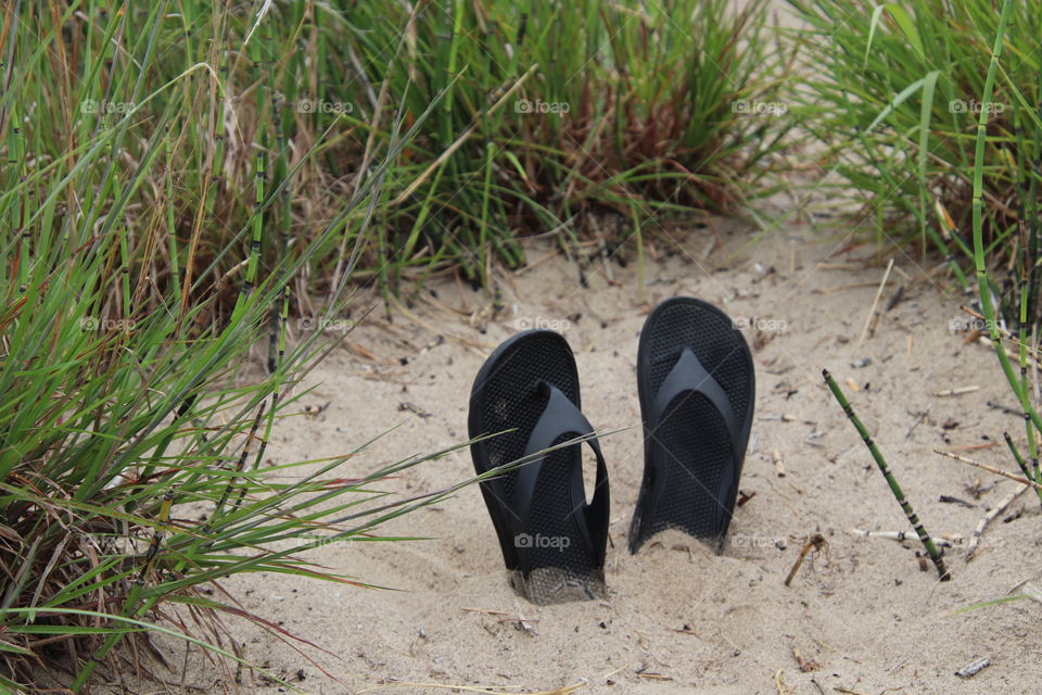 Totes sandals at beach