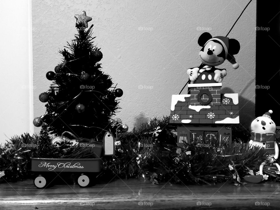 Merry Christmas to all. Micky mouse, the tree, a wagon. all things bright