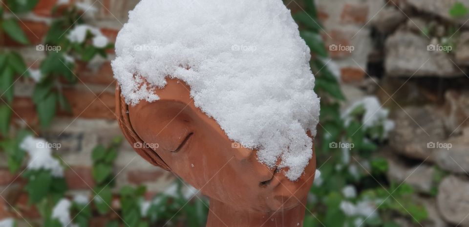 head of a woman in the snow