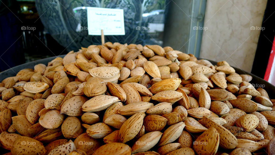 Raw almonds in shells