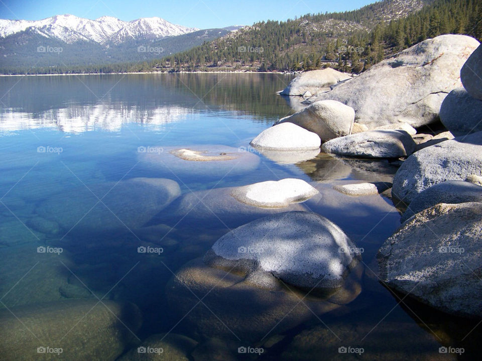 snow water lake rocks by saskins