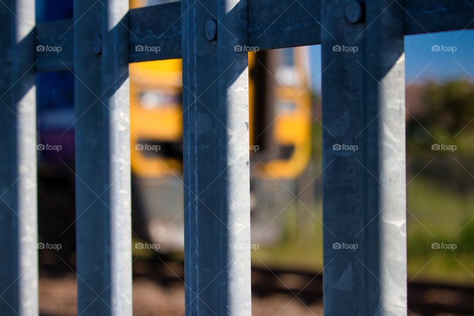 passing train through the railings