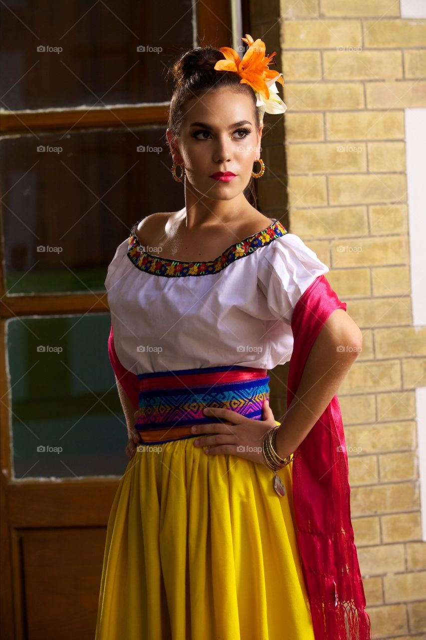 Cute girl in a traditional mexican dress