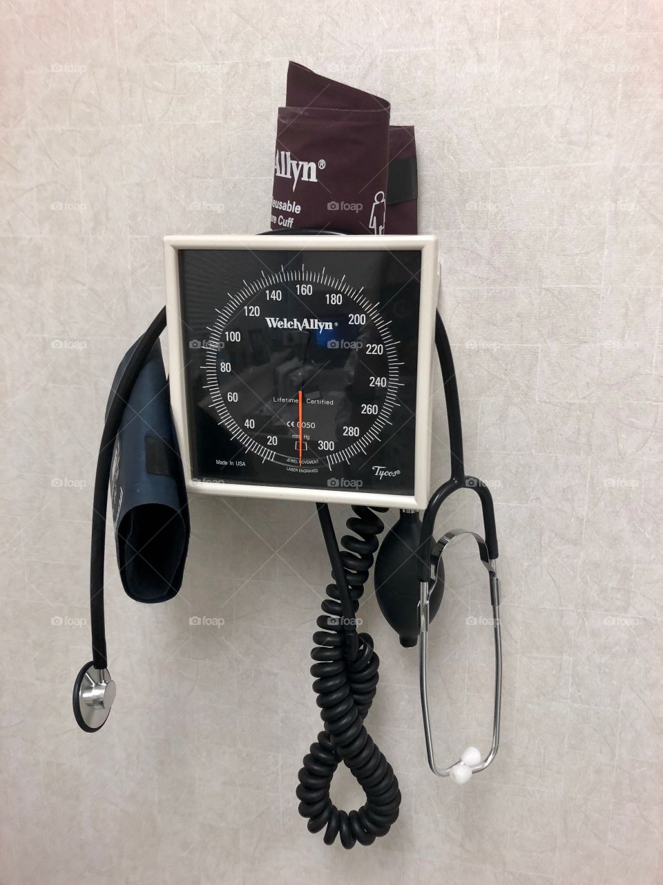 Sphygmomanometer and stethoscope. 