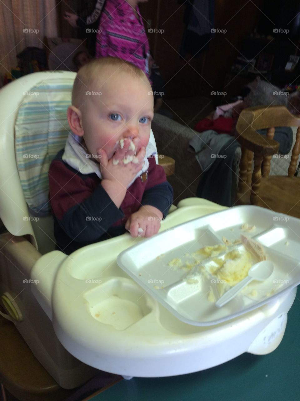 Messy baby eating 