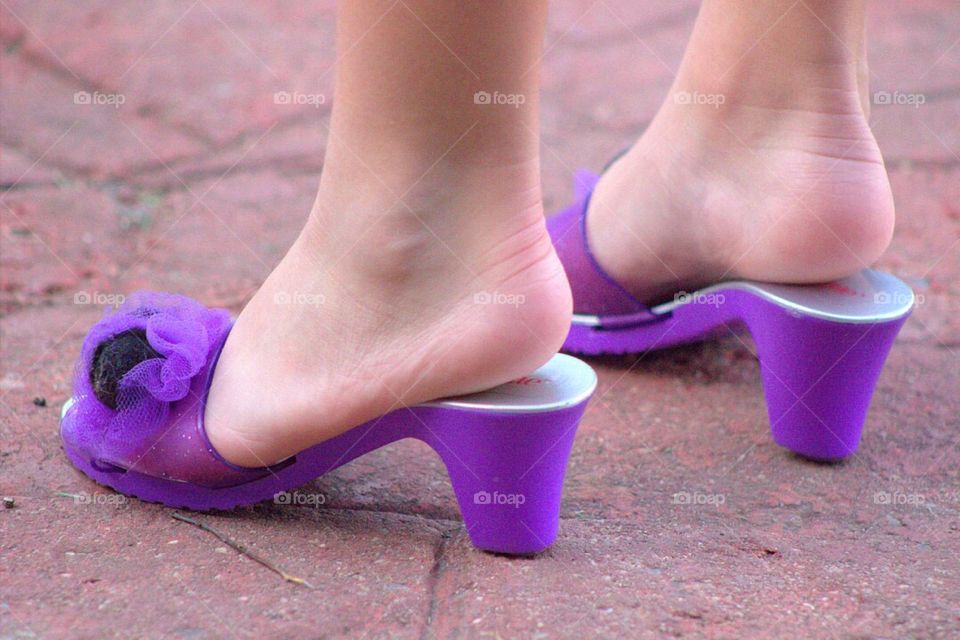 Nothing can stop a girl in purple pumps! 