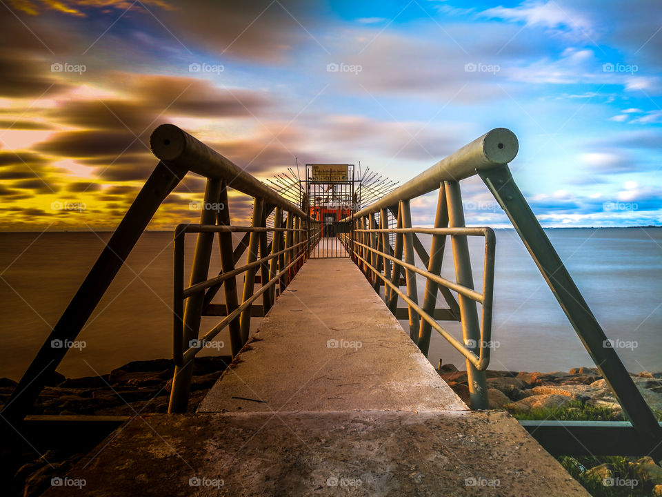 Sunset transitioniong between the bridge