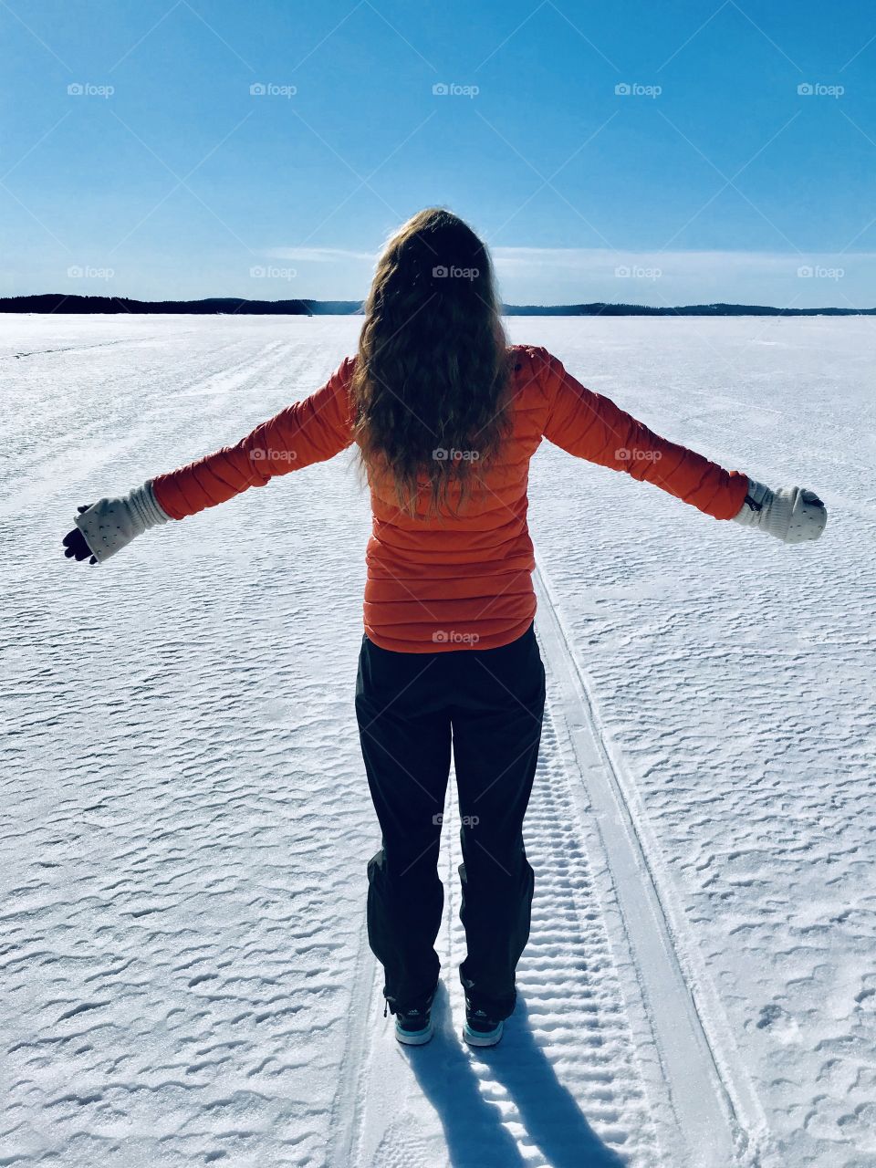 Enjoying the sun on a frozen lake