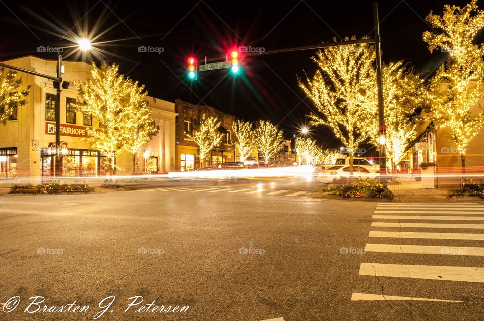 Long exposer photo of my downtown city during the lighting of the trees