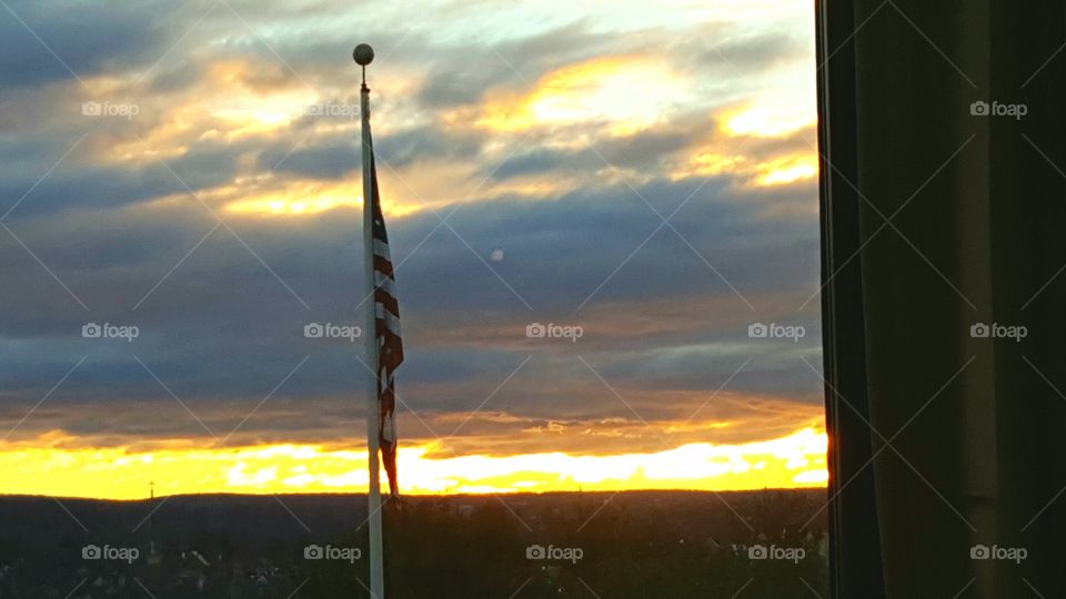 American flag with sunrise
