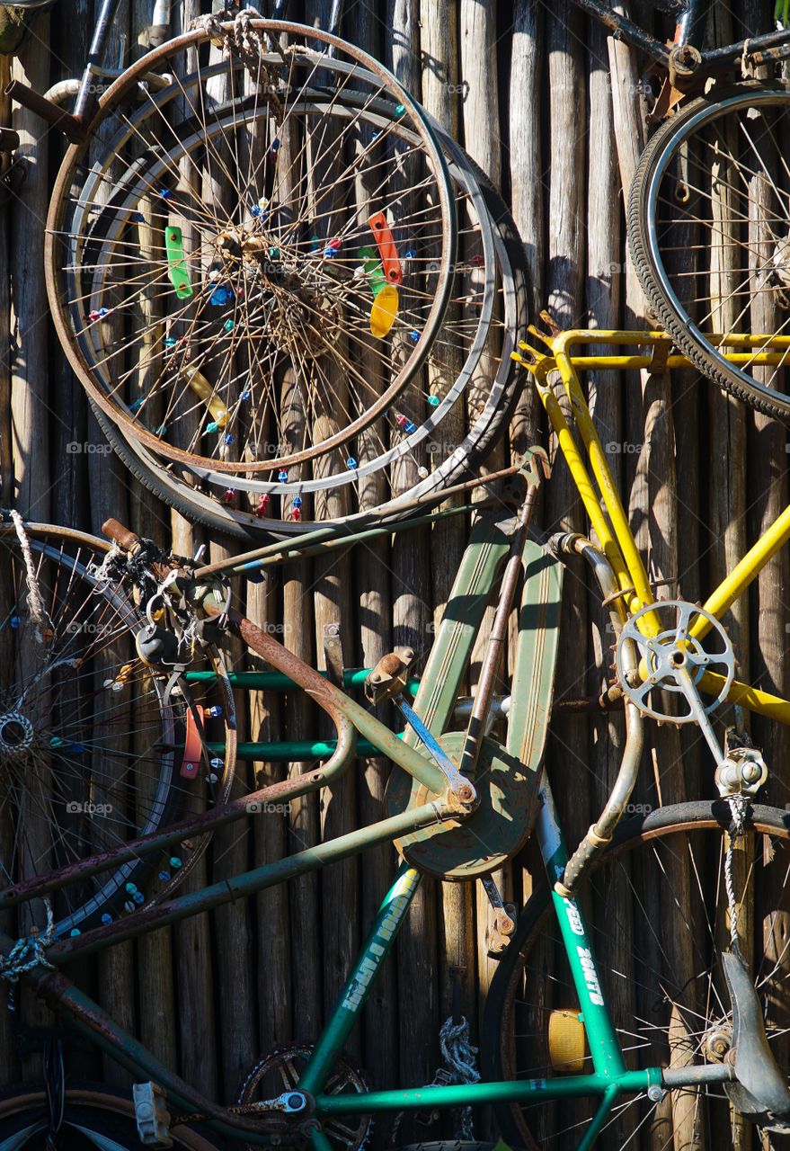 Hanging bicycles outside