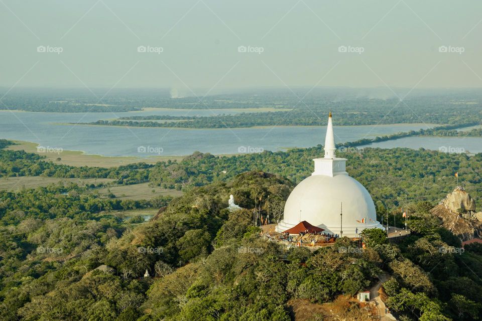 Village Temple Lake Sthupa Mountain. Mihintale is a scenic mountain summit near Anuradhapura in Sri Lanka. It is believed to be the place where Buddhism in the country was originated.