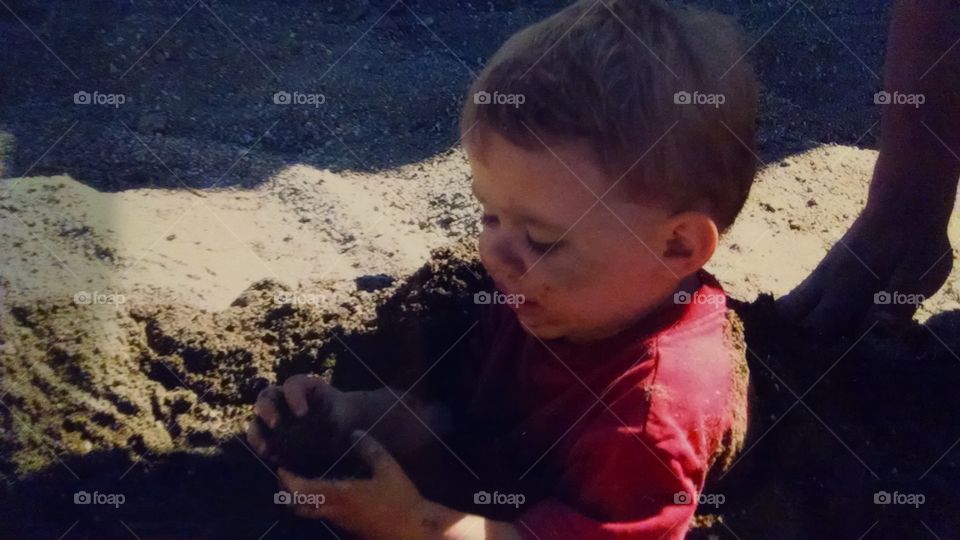 max in the mud. playing in the dirt is always fun
