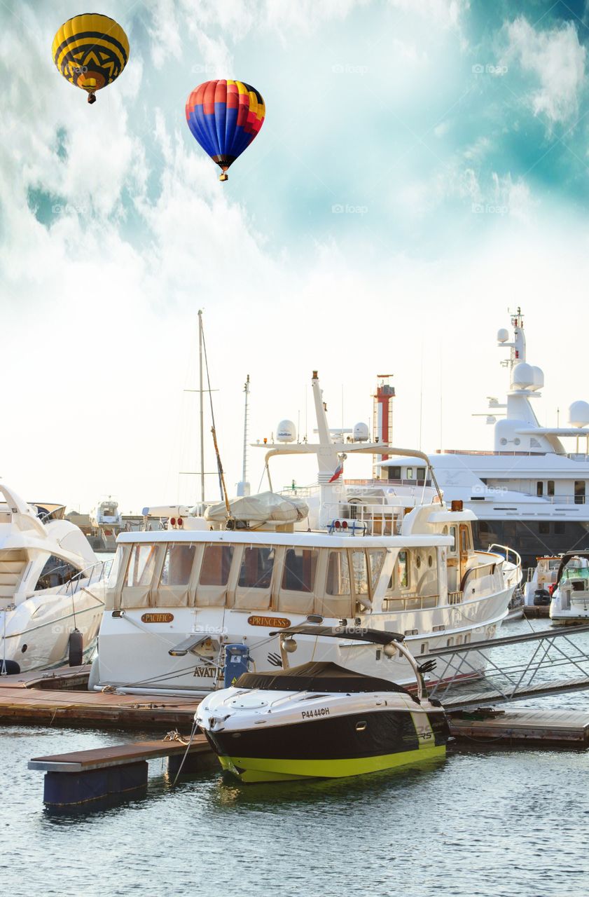 private shipyard boat parking area picture with hot Air balloon