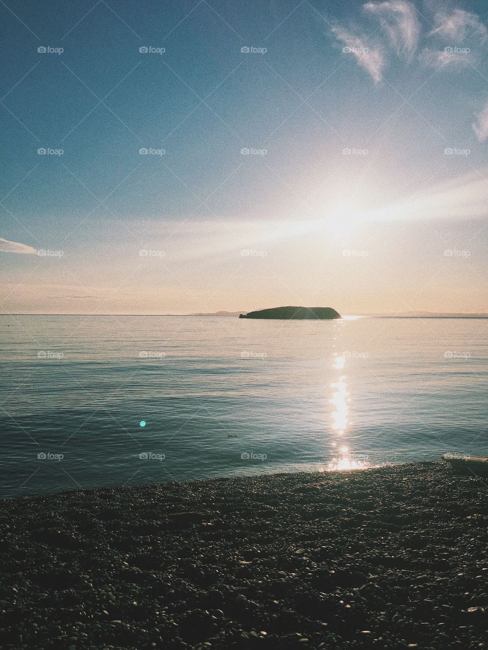 Sunny day view of rocky beach 