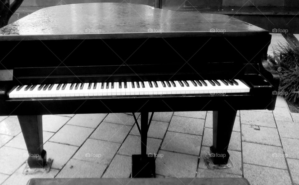 Piano in street in monochrome#
keyboard#concert#outdoors#
quality#