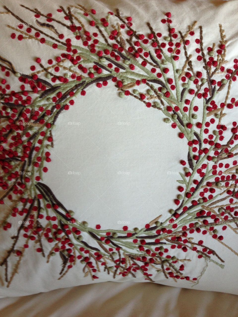 A Winter wreath with red berries, always a nice but simple look.