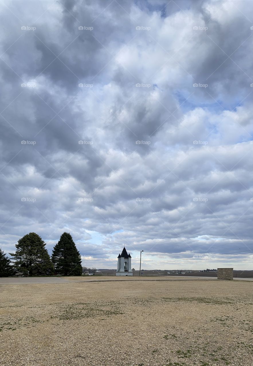 Clouds rolling in over the bell tower. 