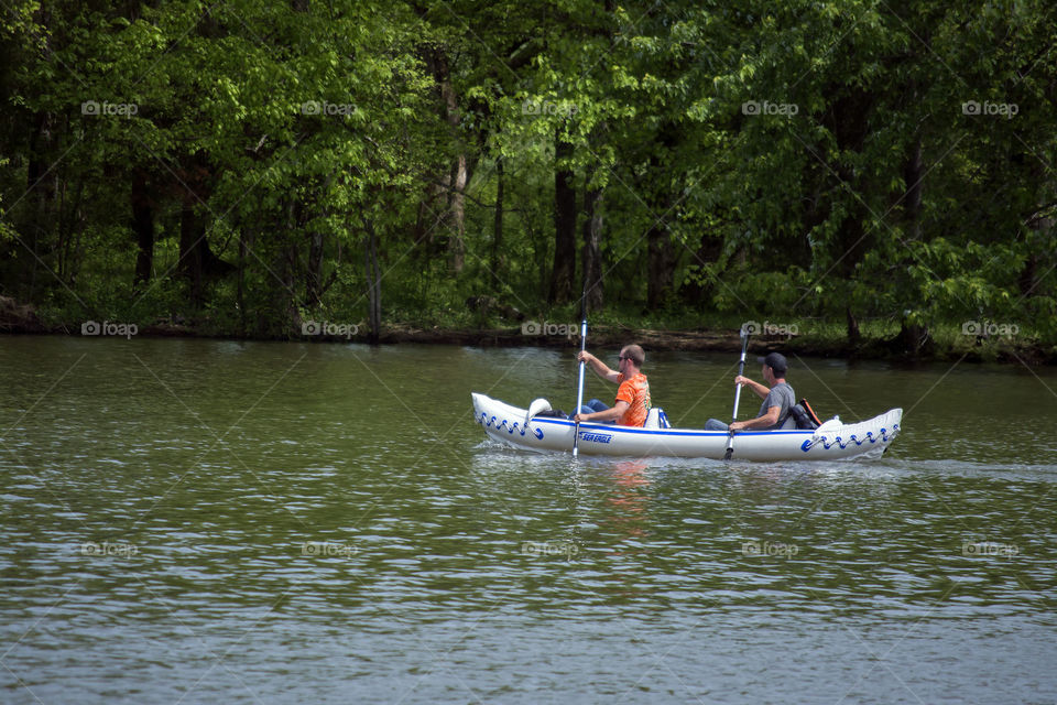 kayaking on the lake . fun in the sun
