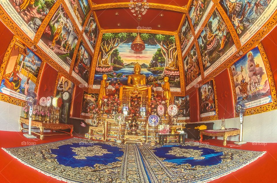 Inside a traditional Thai Buddhist temple.