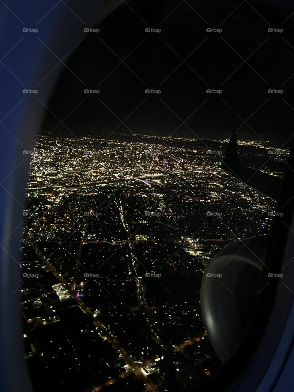 Air Canada Boeing 737 flying over Los Angeles California at night about to land at Los Angeles International Airport (LAX) 
