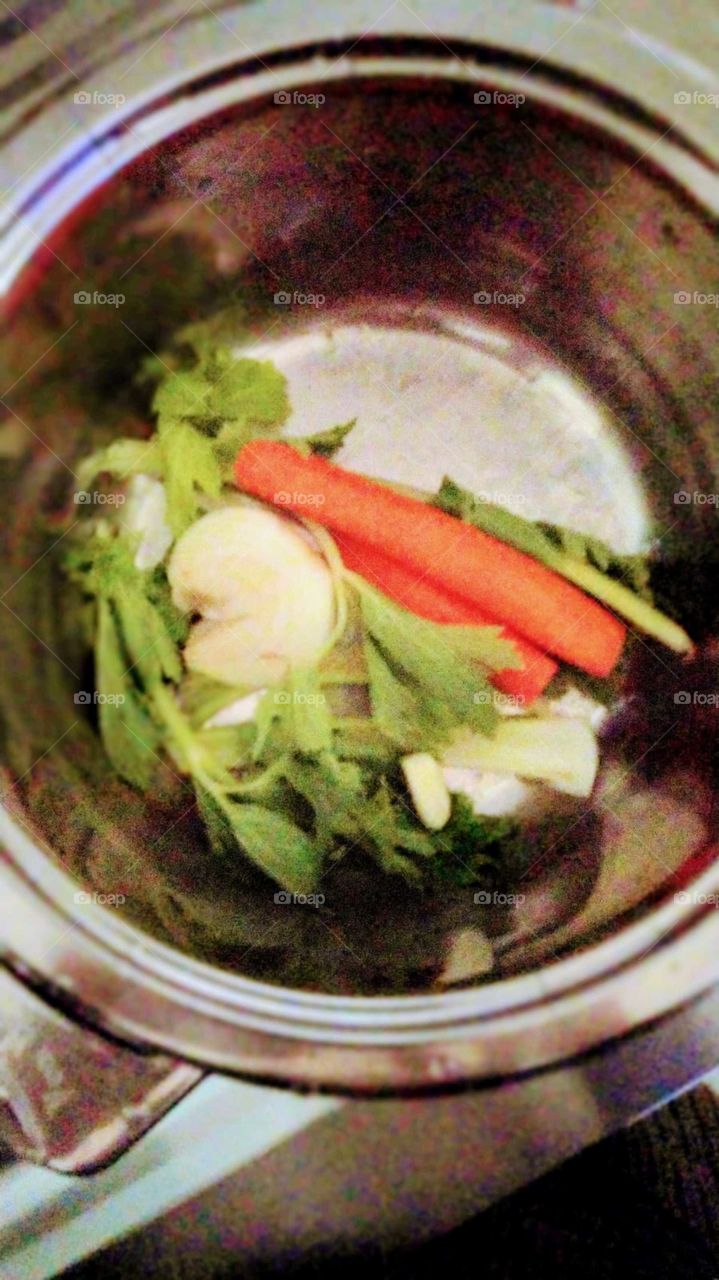 carrots celery and onion inside pot