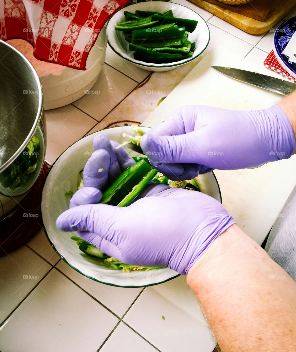 Person seeding jalapeno