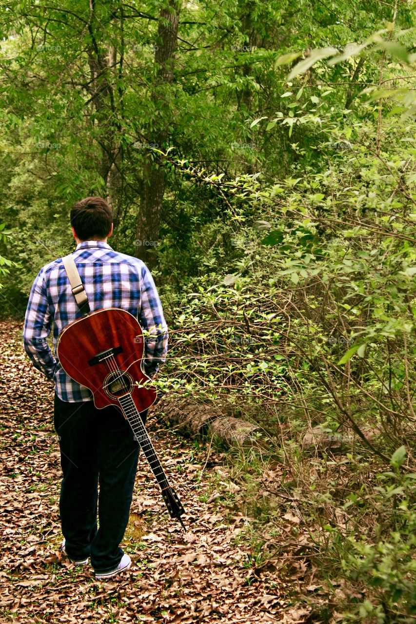 A boy and his acoustic.