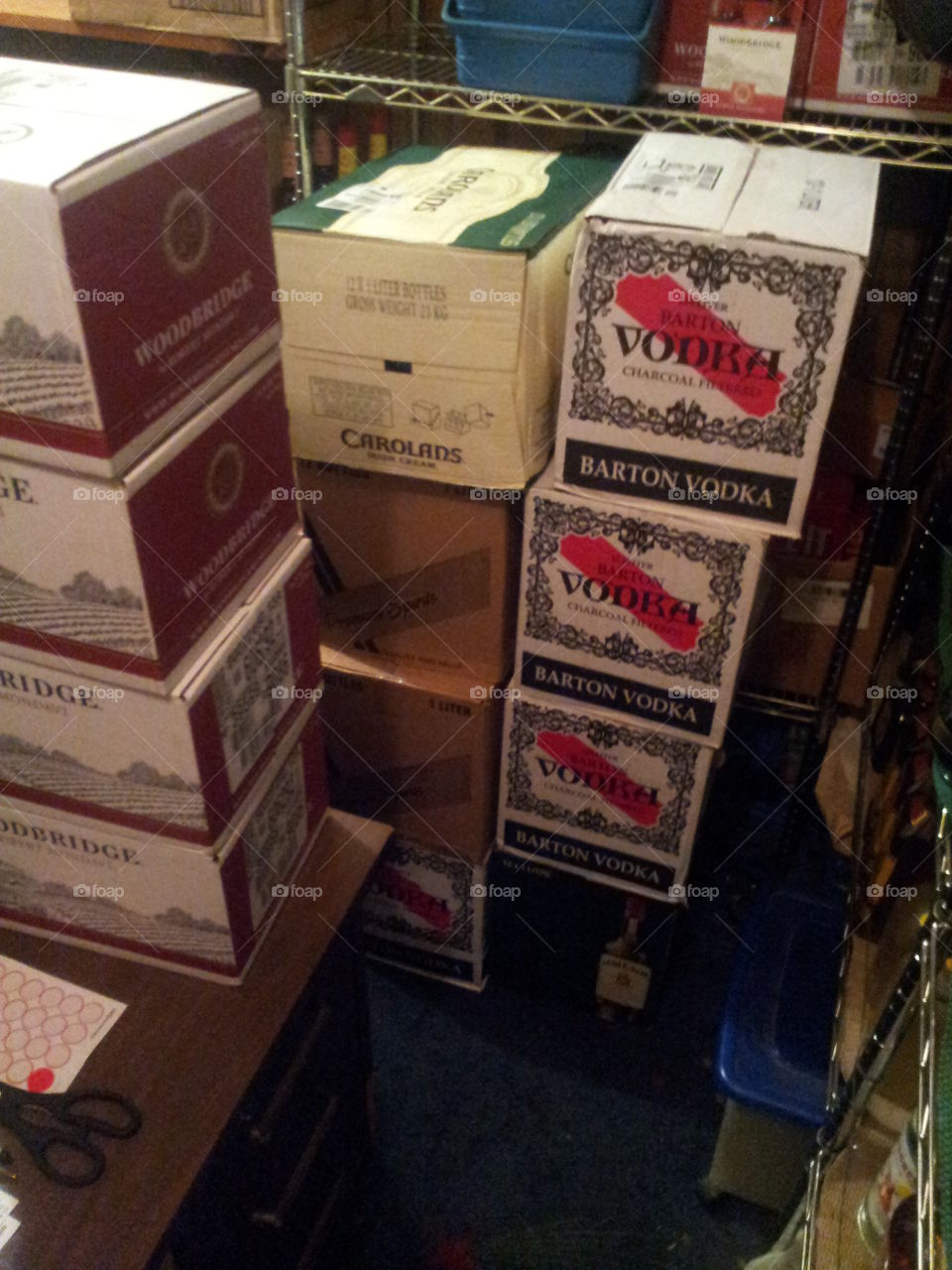 cases of liquor stacked. an order we recieved and I had to put away bottle by bottle.