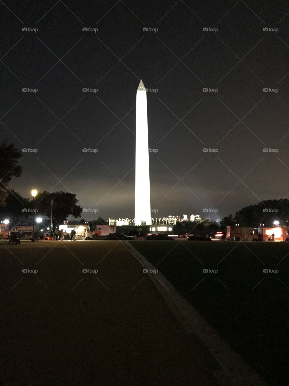 Washington Memorial at night with food trucks, Washington, DC