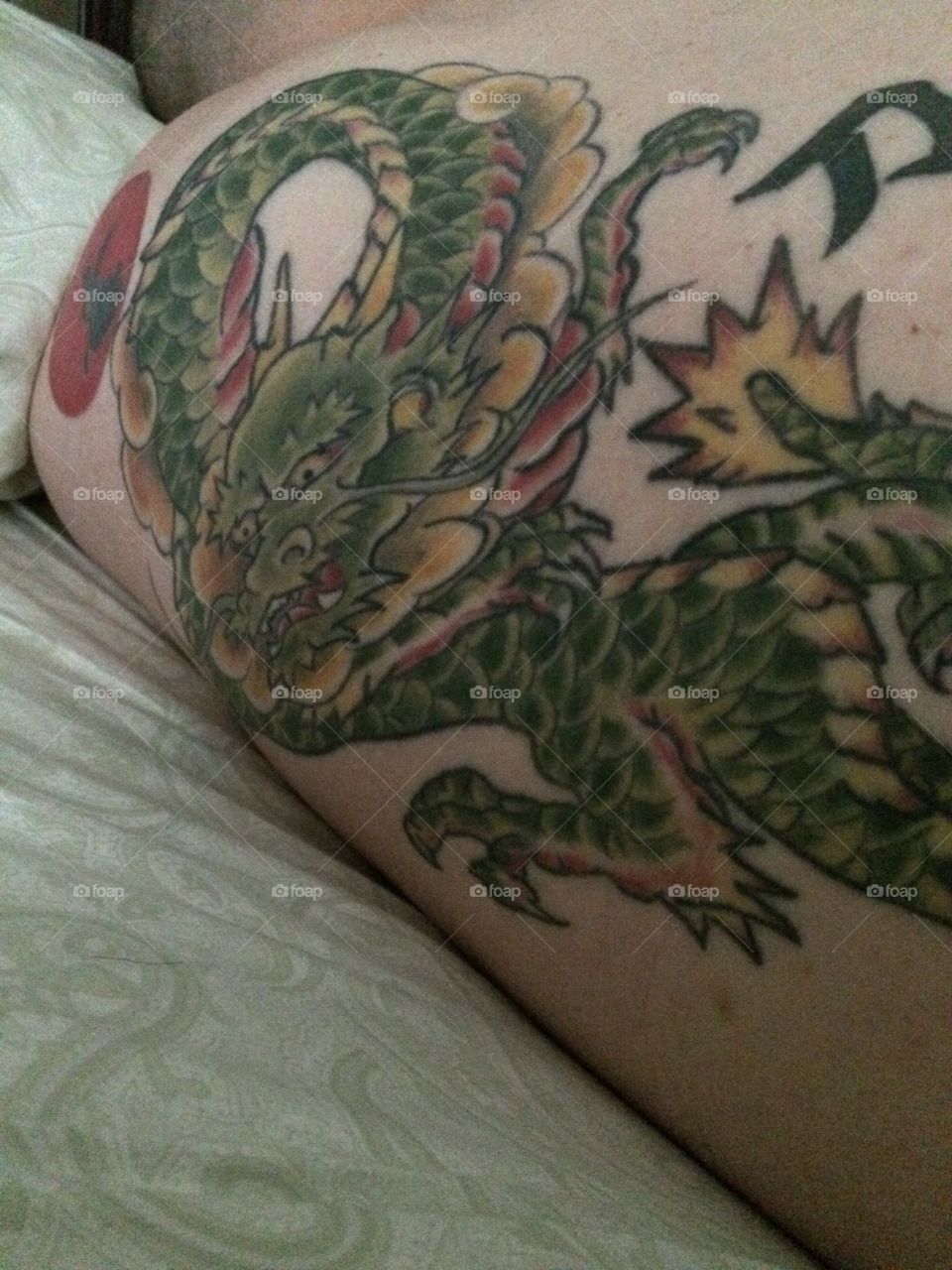 Great Sleeping Dragon . My husband's tattoo 