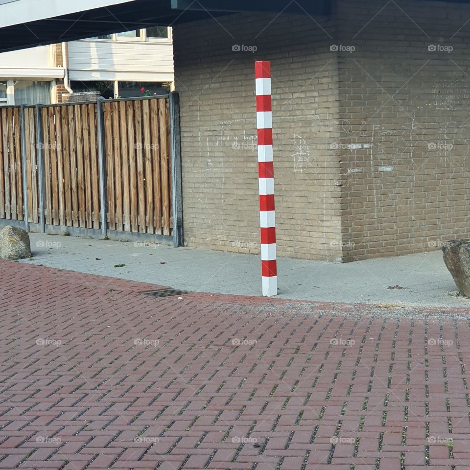 Red / White marked pole.
