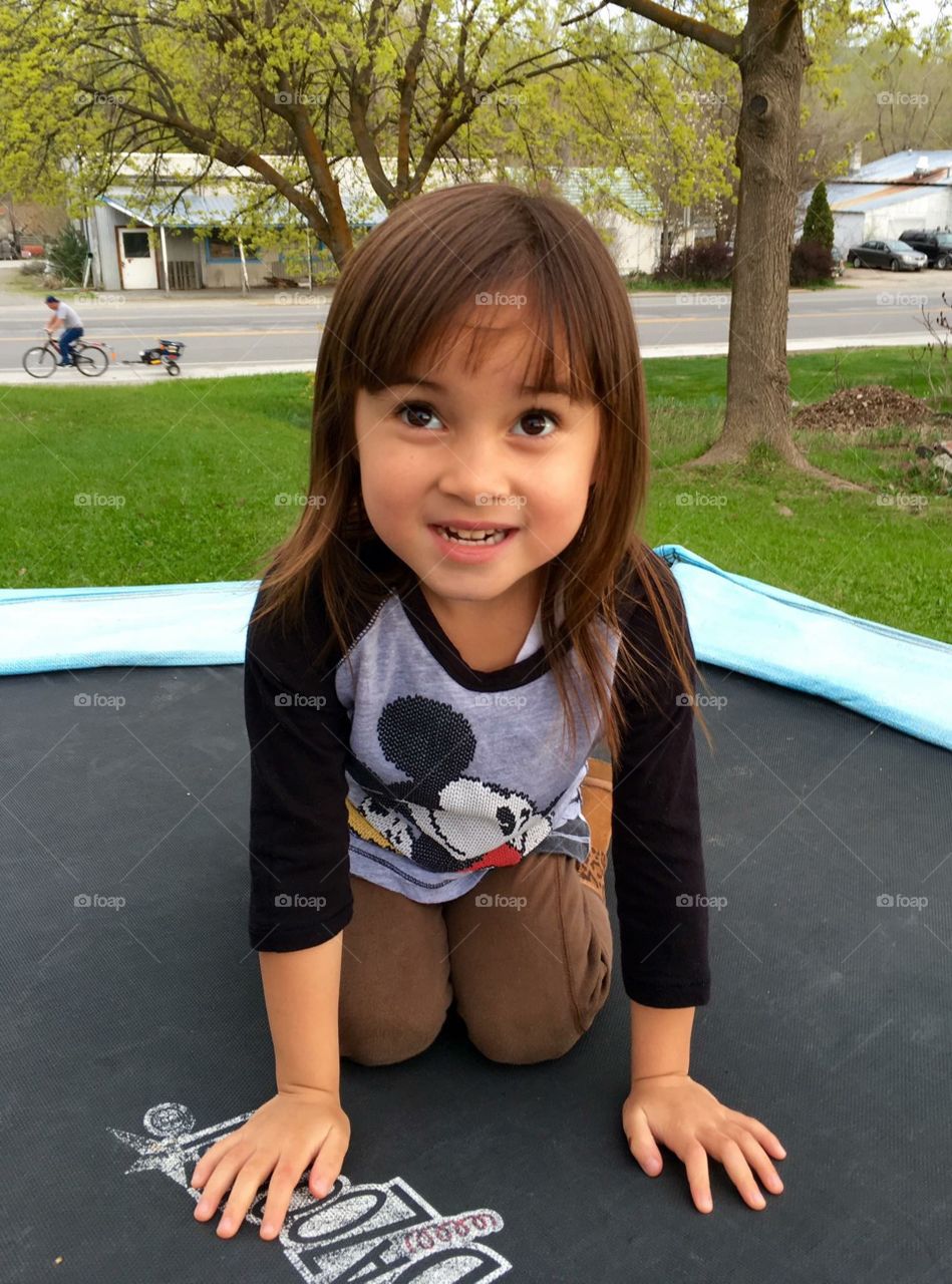 Playing trampoline