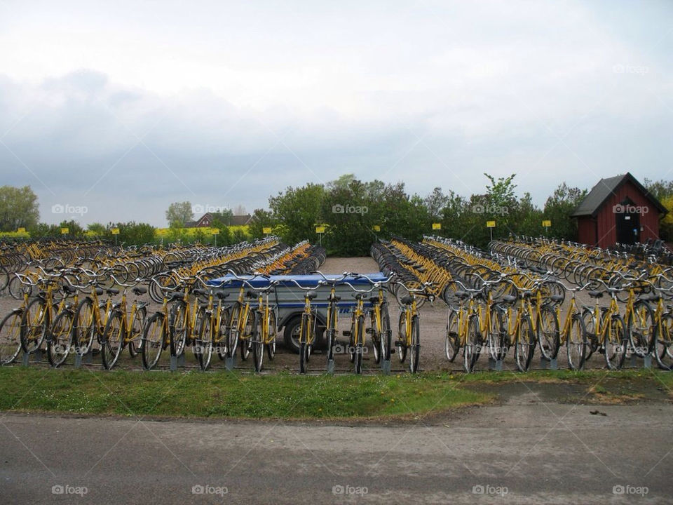 sweden yellow transport bikes by toraand