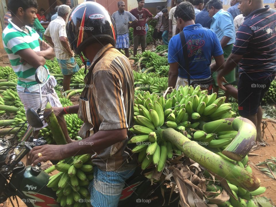 Loading bananas in srilanka market