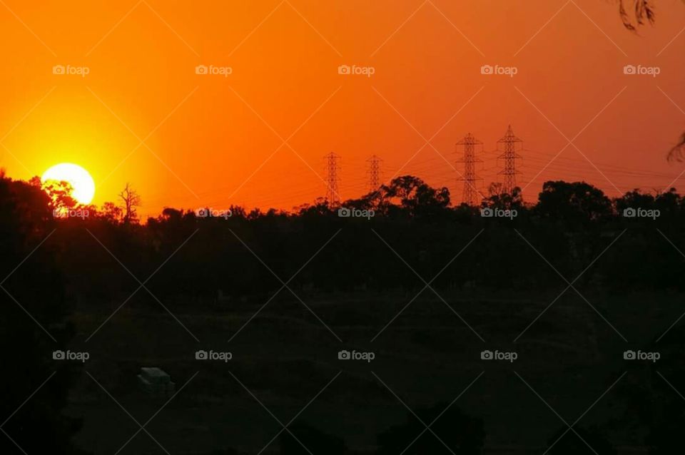 When bushfires blaze australian paddocks, the smoke blocks out the sun. During the sunset, it is scary, it is haunting. It is beautiful.