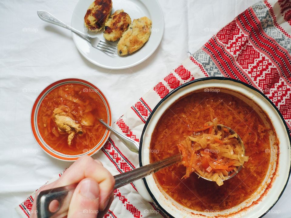 Ukrainian borscht, pies with meat on the table